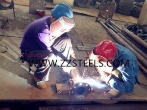 Welding flange onto pipe end